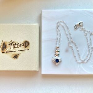Sterling Silver Heart Pendant Necklace with Blue Center Stone